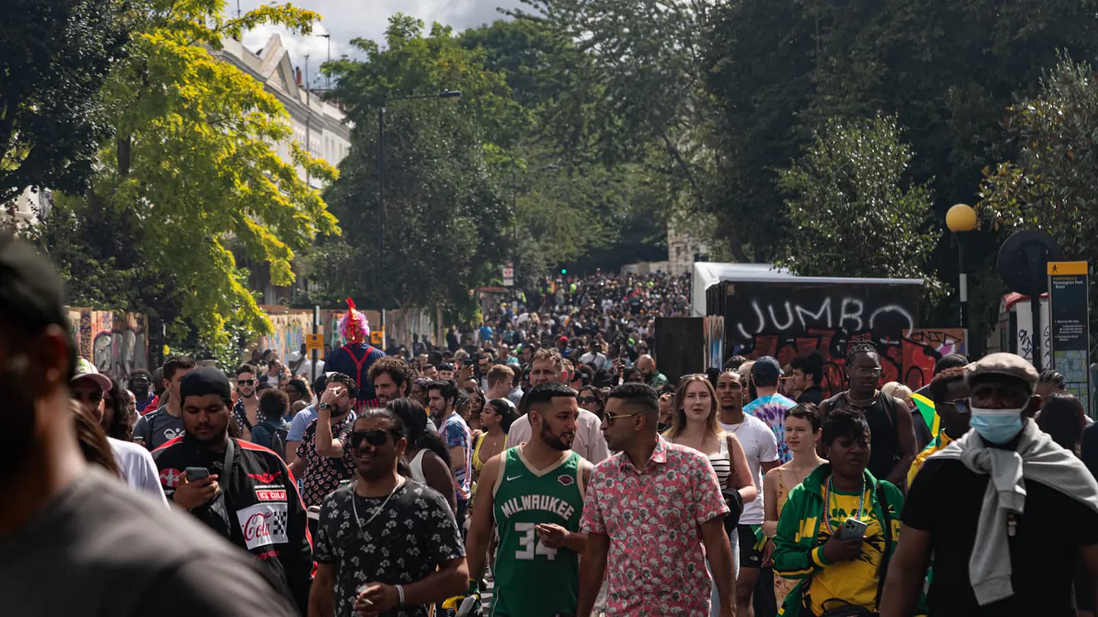 Crowds filling a street near Notting Hill Carnival in west London