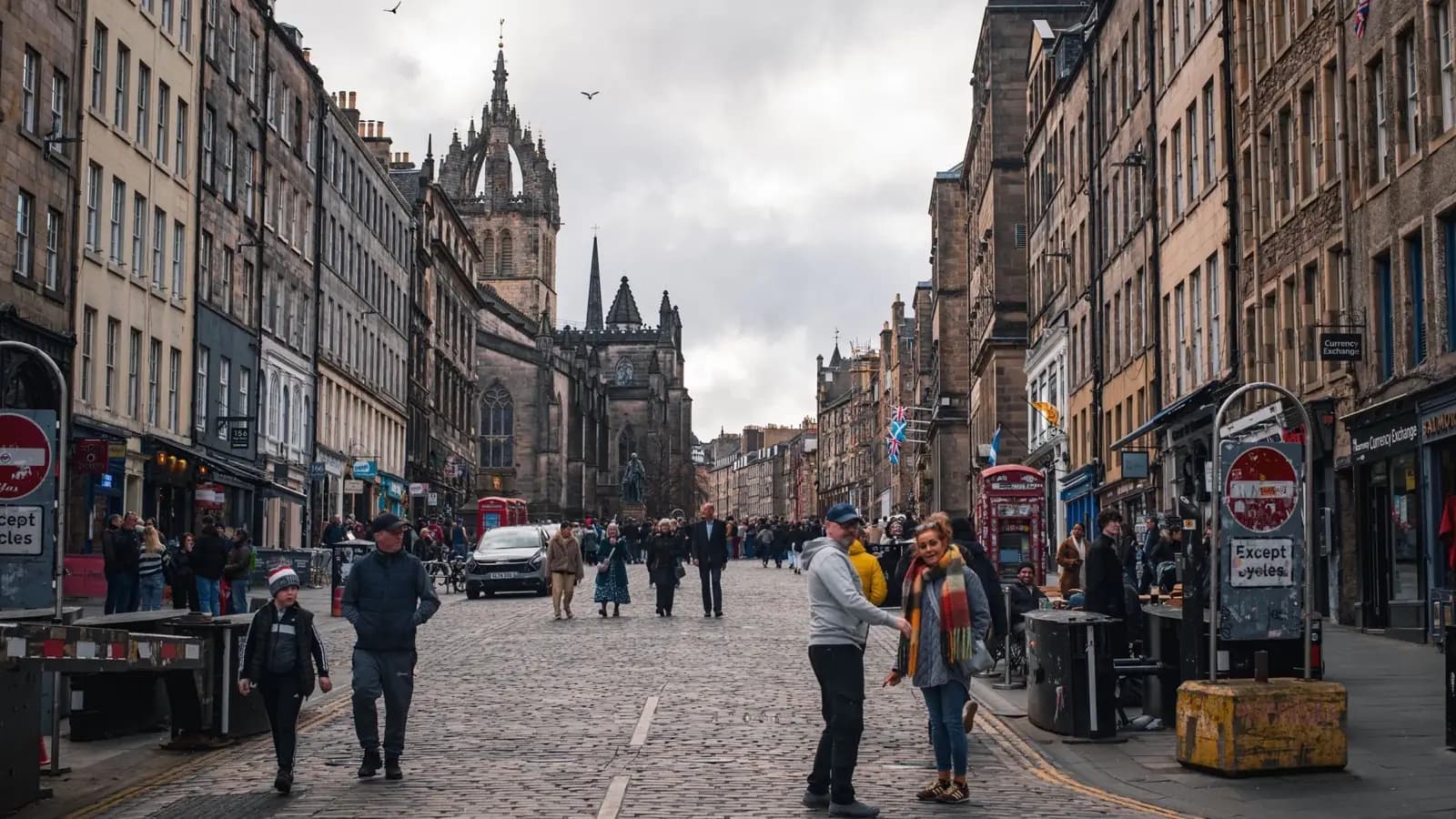 Crowds walking along Edinburgh's Royal Mile near St Giles Cathedral