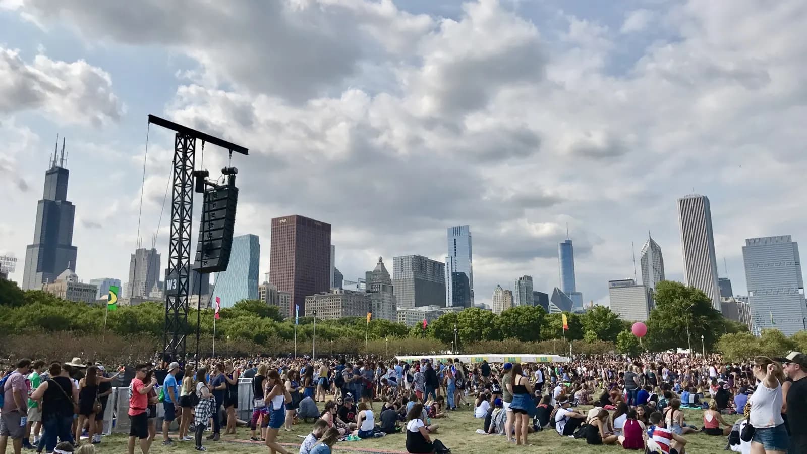 Lollapalooza crowd in Grant Park with the Chicago skyline