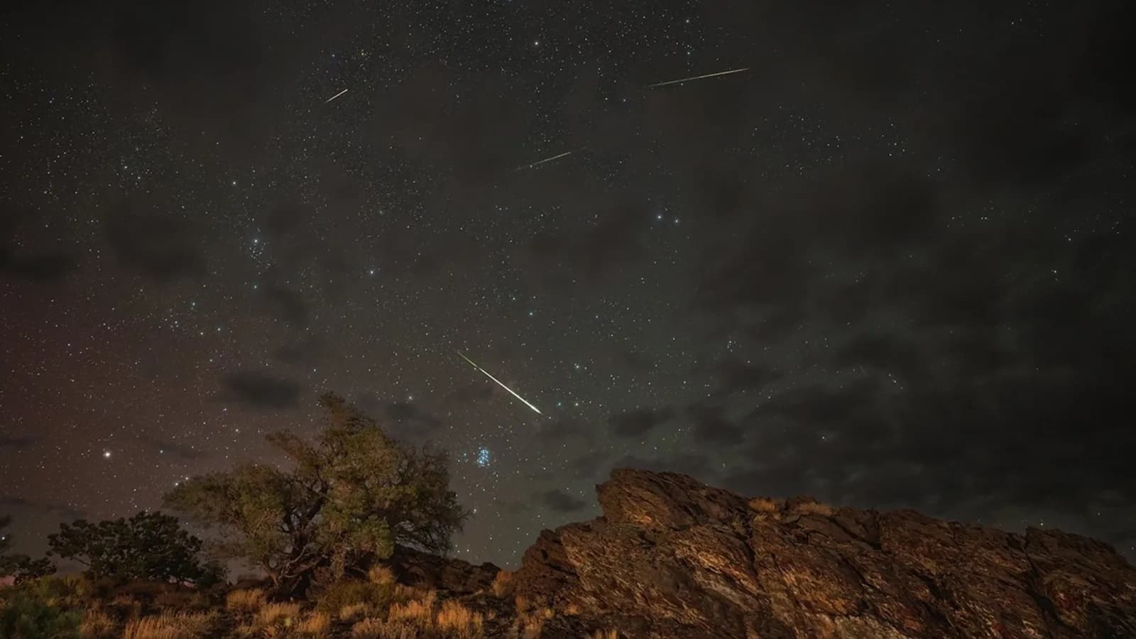 Perseid meteors above a rocky landscape in Inyo National Forest