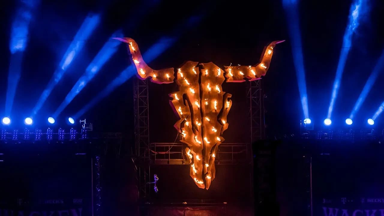 The flaming bullhead emblem above a Wacken Open Air stage
