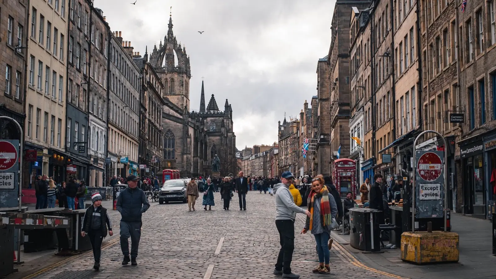 Crowds walking along Edinburgh's Royal Mile near St Giles Cathedral