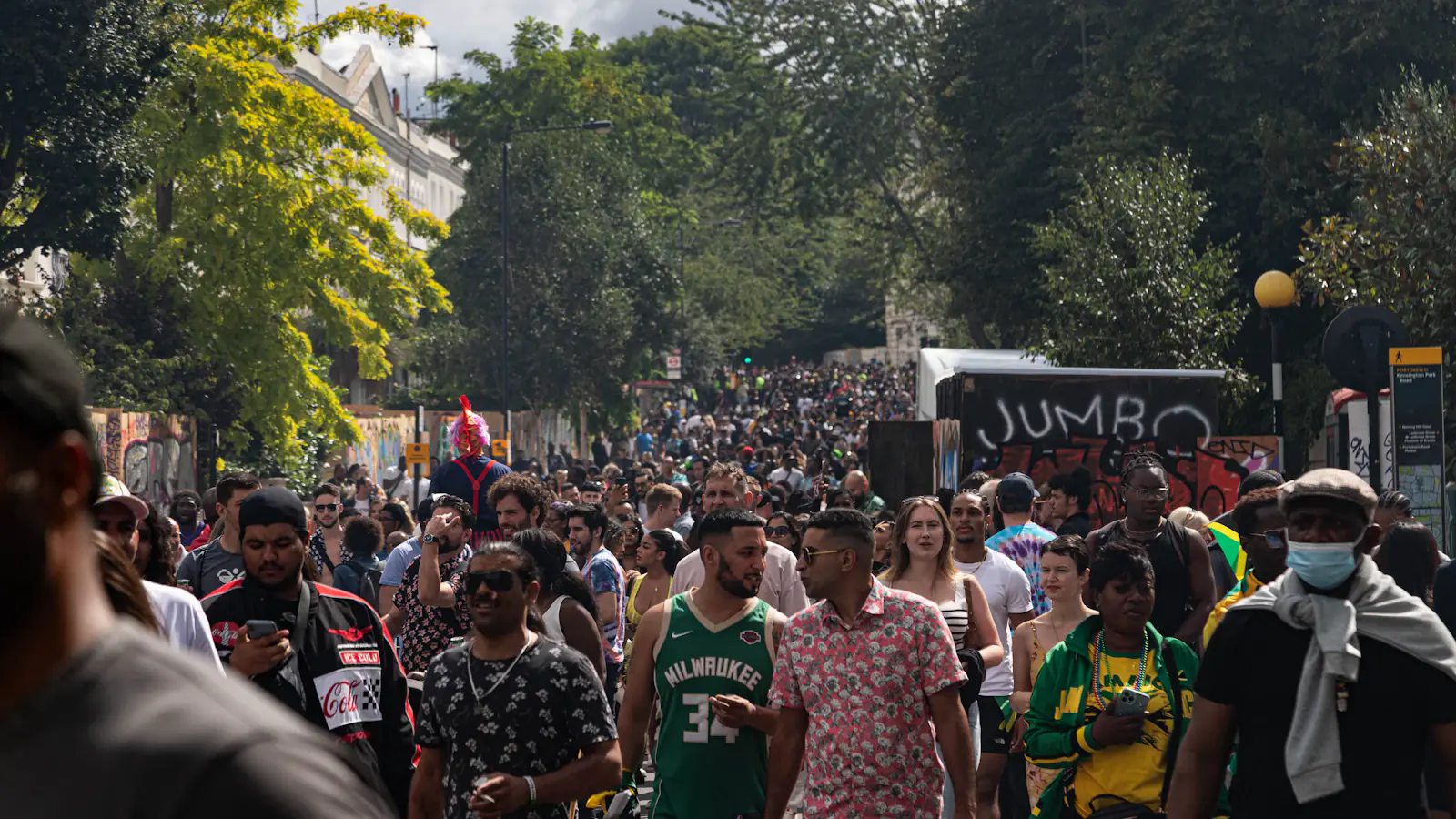 Crowds filling a street near Notting Hill Carnival in west London